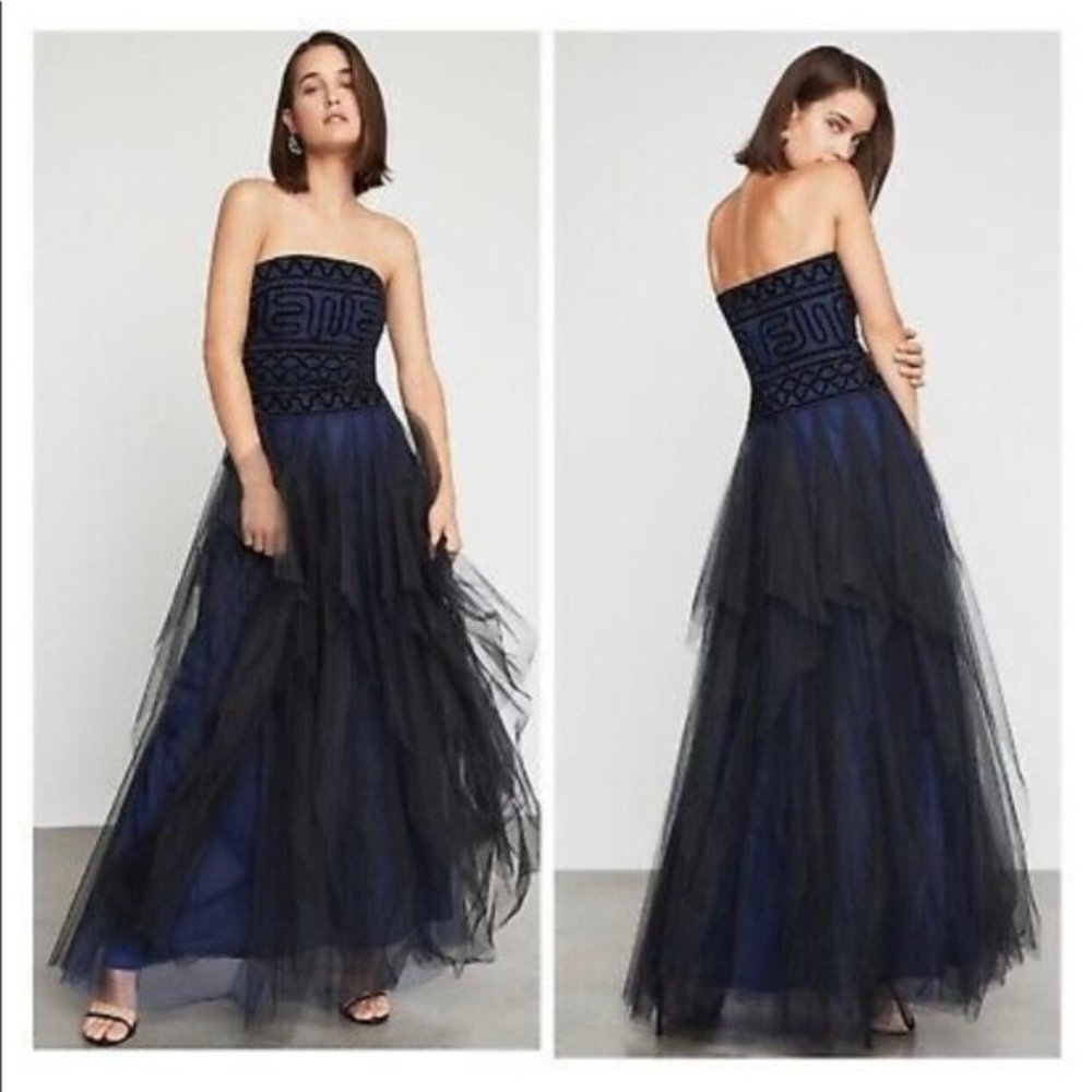 This is a BCBG Maxazria navy blue and black tulle strapless evening gown, size 8